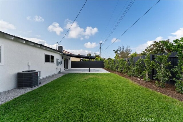 2514 S Rita Way, Santa Ana, CA 92704 - view of yard featuring a patio area and central AC unit