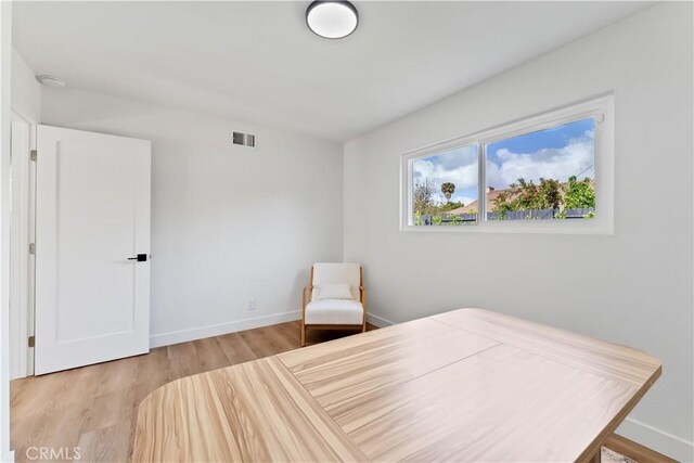 2514 S Rita Way, Santa Ana, CA 92704 - bedroom featuring wood finished floors and baseboards