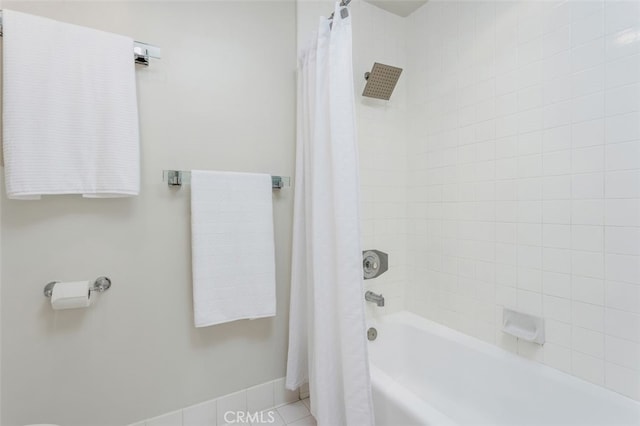 2005 Costa Del Mar Rd Unit 632, Carlsbad, CA 92009 - bathroom featuring shower / bathtub combination with curtain, tile patterned floors, and baseboards