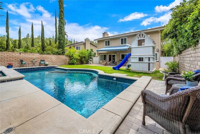 24441 Indian Hill Ln, West Hills, CA 91307 - view of swimming pool featuring a patio and a fenced backyard