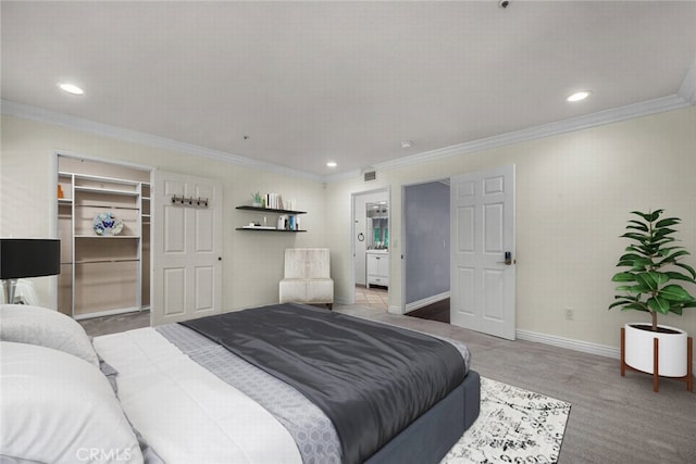 24441 Indian Hill Ln, West Hills, CA 91307 - carpeted bedroom with crown molding, recessed lighting, and a walk in closet