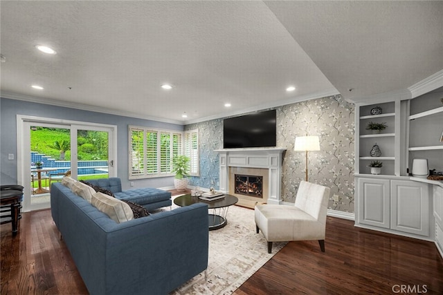 24441 Indian Hill Ln, West Hills, CA 91307 - living area featuring dark wood-style floors, ornamental molding, a warm lit fireplace, a textured ceiling, and recessed lighting