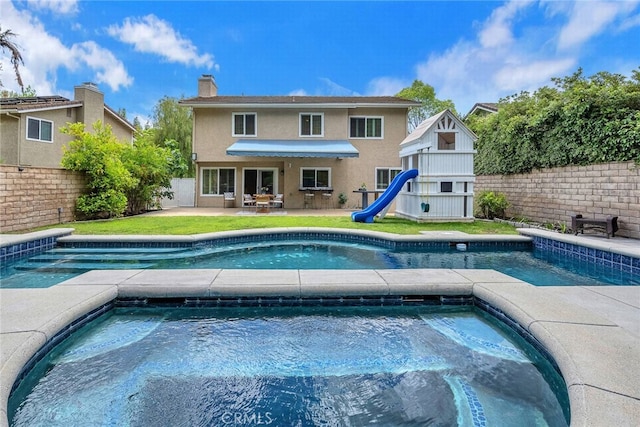 24441 Indian Hill Ln, West Hills, CA 91307 - view of swimming pool featuring an in-ground hot tub, a fenced backyard, and a patio
