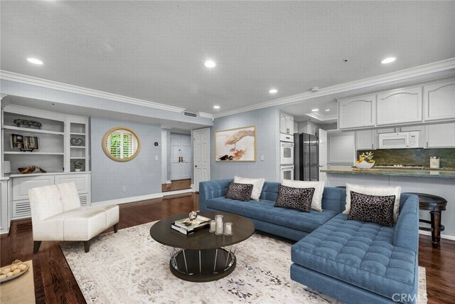 24441 Indian Hill Ln, West Hills, CA 91307 - living area featuring dark wood-style flooring, ornamental molding, and recessed lighting