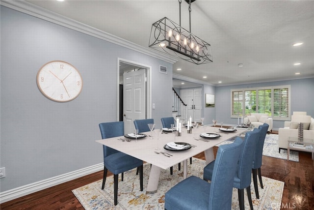 24441 Indian Hill Ln, West Hills, CA 91307 - dining room featuring stairs, dark wood-style flooring, a chandelier, ornamental molding, and recessed lighting