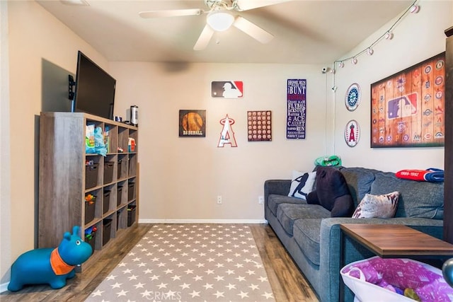 25515 Mountain Springs St, Menifee, CA 92584 - living room with wood finished floors, a ceiling fan, and baseboards