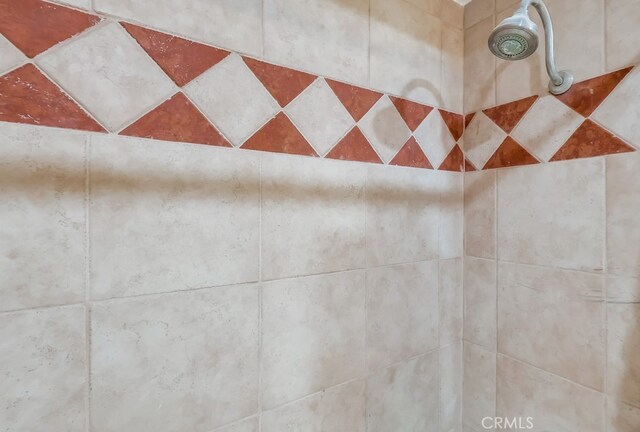 bathroom view of tiled shower