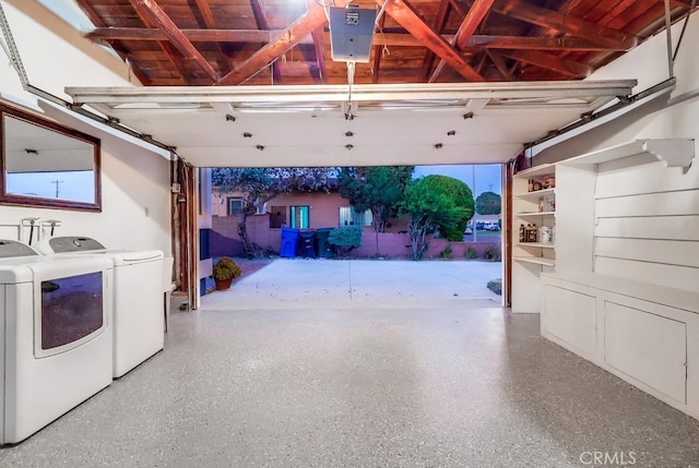 garage with washer and dryer
