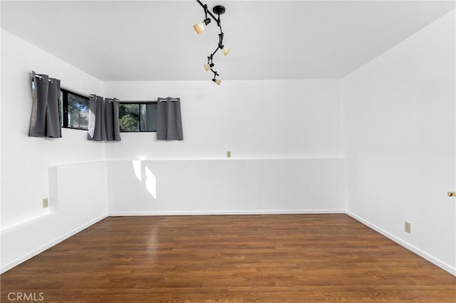 5740 Violeta Ave, Atascadero, CA 93422 - unfurnished room with wood finished floors and baseboards