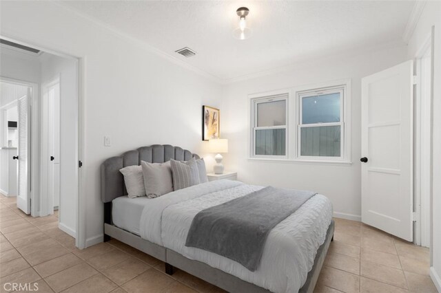 1710 Plaza Del Norte, Newport Beach, CA 92661 - bedroom featuring light tile patterned floors and ornamental molding