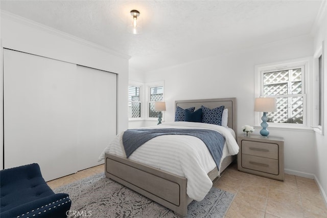 1710 Plaza Del Norte, Newport Beach, CA 92661 - bedroom featuring multiple windows, light tile patterned flooring, ornamental molding, and a closet