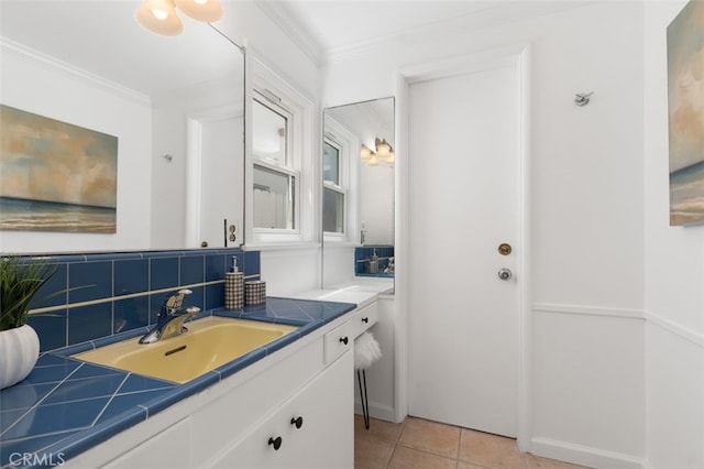 1710 Plaza Del Norte, Newport Beach, CA 92661 - bathroom featuring vanity, ornamental molding, tile patterned flooring, and tasteful backsplash