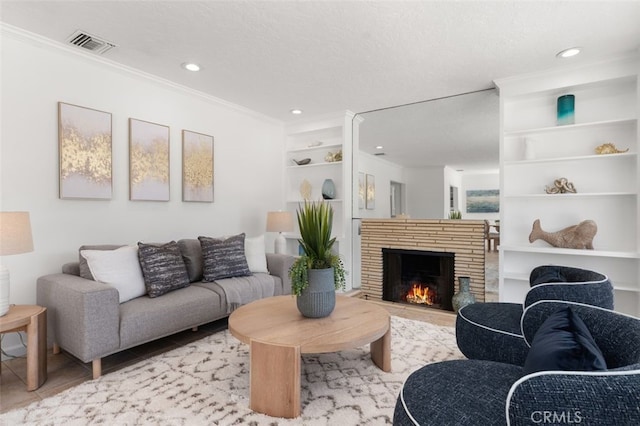 1710 Plaza Del Norte, Newport Beach, CA 92661 - living area featuring crown molding, wood finished floors, a brick fireplace, and recessed lighting