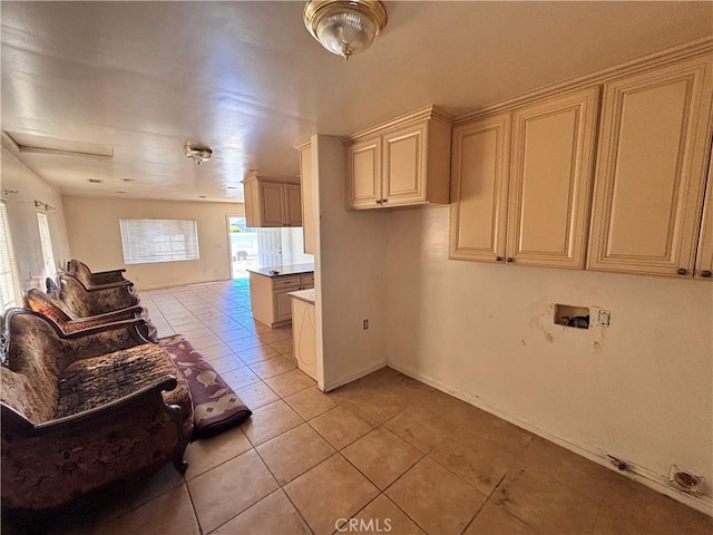 2413 Maynard Dr, Duarte, CA 91010 - kitchen featuring cream cabinets, open floor plan, light tile patterned floors, light countertops, and baseboards