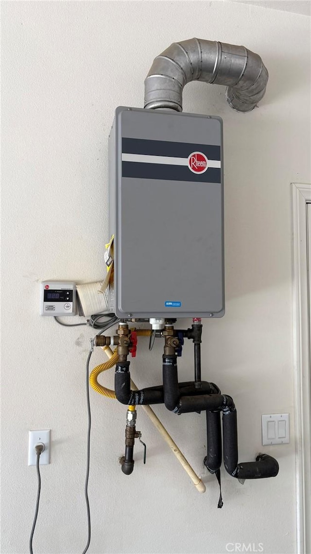 14247 Symphony Ct, Eastvale, CA 92880 - utilities featuring tankless water heater