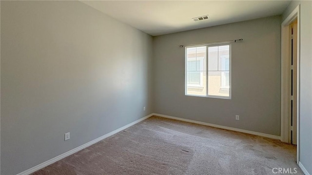 14247 Symphony Ct, Eastvale, CA 92880 - spare room featuring carpet floors and baseboards