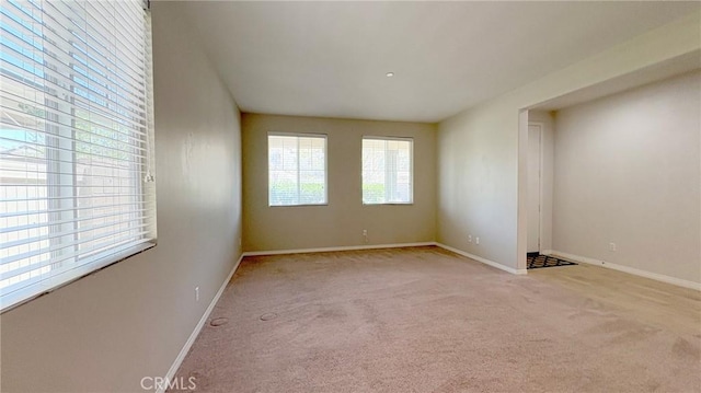 14247 Symphony Ct, Eastvale, CA 92880 - spare room featuring carpet floors and baseboards