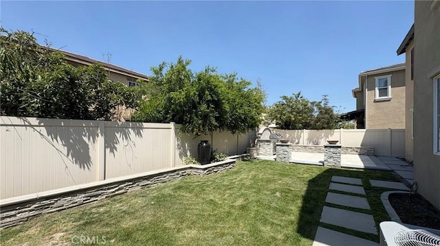 14247 Symphony Ct, Eastvale, CA 92880 - view of yard featuring a patio area