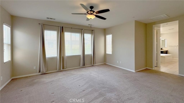 14247 Symphony Ct, Eastvale, CA 92880 - carpeted spare room featuring ceiling fan and baseboards