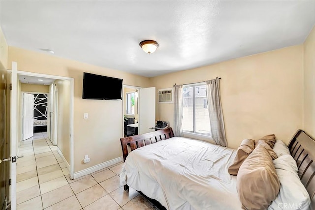 38714 Puerta Ave, Palmdale, CA 93550 - bedroom featuring light tile patterned flooring, baseboards, and a wall mounted AC