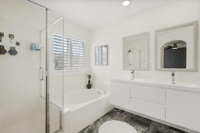 1444 Wooden Valley St, Chula Vista, CA 91913 - full bathroom featuring a shower stall, a garden tub, ceiling fan, and double vanity