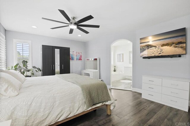 1444 Wooden Valley St, Chula Vista, CA 91913 - bedroom featuring arched walkways, dark wood-type flooring, recessed lighting, a ceiling fan, and ensuite bath