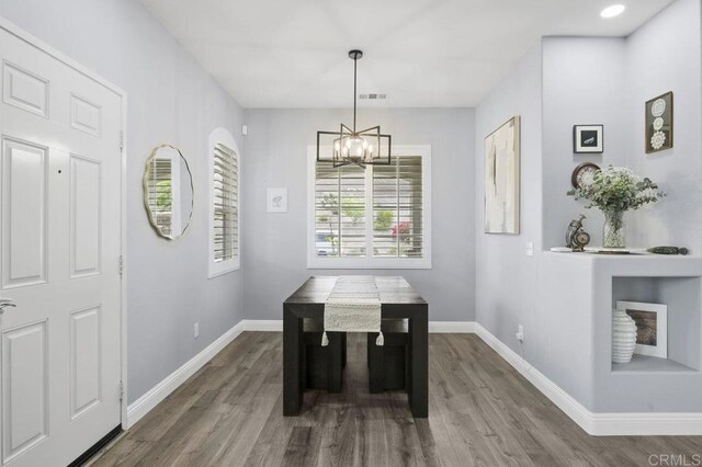 1444 Wooden Valley St, Chula Vista, CA 91913 - dining area featuring a chandelier and wood finished floors