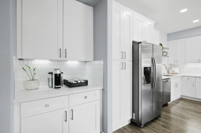 1444 Wooden Valley St, Chula Vista, CA 91913 - kitchen with appliances with stainless steel finishes, white cabinetry, light countertops, and recessed lighting