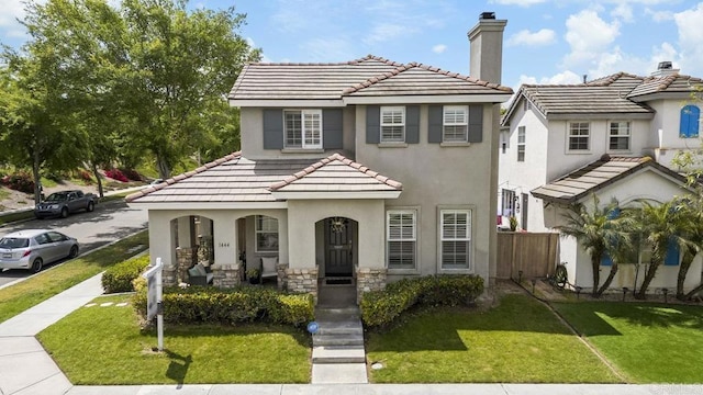 1444 Wooden Valley St, Chula Vista, CA 91913 - view of front of home with a porch, stucco siding, a tile roof, and a chimney