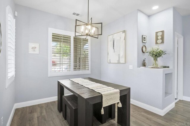1444 Wooden Valley St, Chula Vista, CA 91913 - dining area featuring wood finished floors and a chandelier