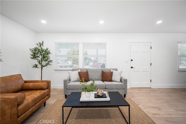 6131 Chickasaw Dr, Westminster, CA 92683 - living room featuring light wood-style flooring, baseboards, and recessed lighting