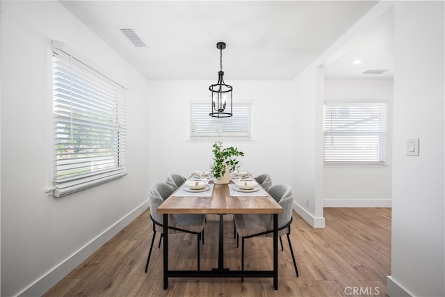 6131 Chickasaw Dr, Westminster, CA 92683 - dining room with wood finished floors and baseboards