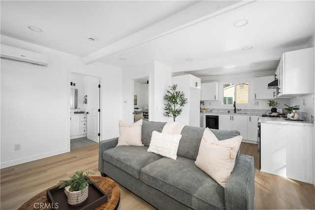 6131 Chickasaw Dr, Westminster, CA 92683 - living area featuring a wall mounted air conditioner, light wood-style floors, baseboards, recessed lighting, and beamed ceiling