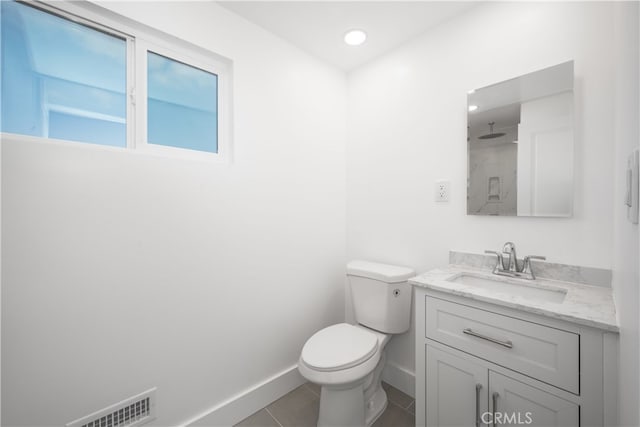6131 Chickasaw Dr, Westminster, CA 92683 - bathroom with toilet, vanity, baseboards, tile patterned flooring, and recessed lighting