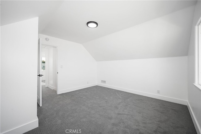6131 Chickasaw Dr, Westminster, CA 92683 - bonus room featuring lofted ceiling, dark carpet, and baseboards