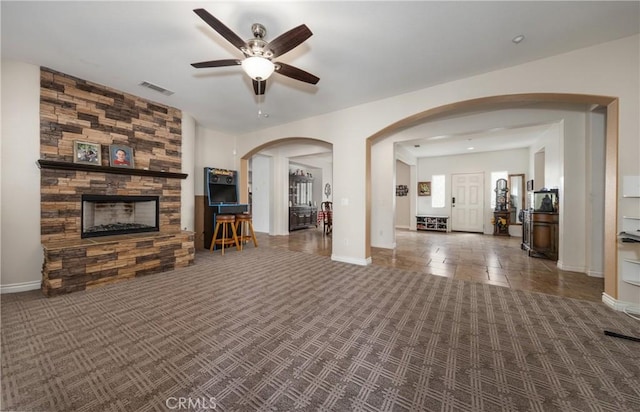 7840 La Cresta St, Highland, CA 92346 - unfurnished living room with carpet flooring, baseboards, and ceiling fan