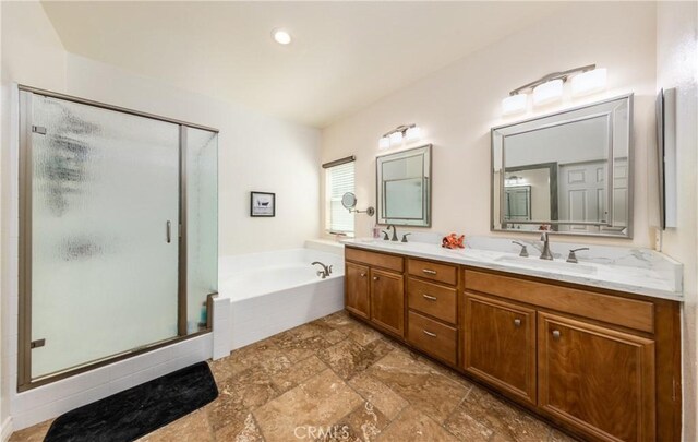 7840 La Cresta St, Highland, CA 92346 - full bath with a stall shower, a garden tub, stone tile flooring, double vanity, and recessed lighting