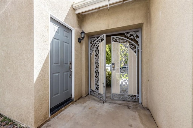7840 La Cresta St, Highland, CA 92346 - view of exterior entry featuring stucco siding