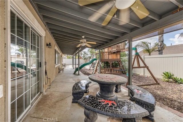 7840 La Cresta St, Highland, CA 92346 - view of patio featuring a playground, a fenced backyard, and ceiling fan