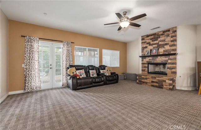 7840 La Cresta St, Highland, CA 92346 - carpeted living area with a ceiling fan, a fireplace, french doors, and baseboards