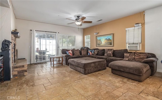 7840 La Cresta St, Highland, CA 92346 - living room with stone tile floors, cooling unit, and ceiling fan