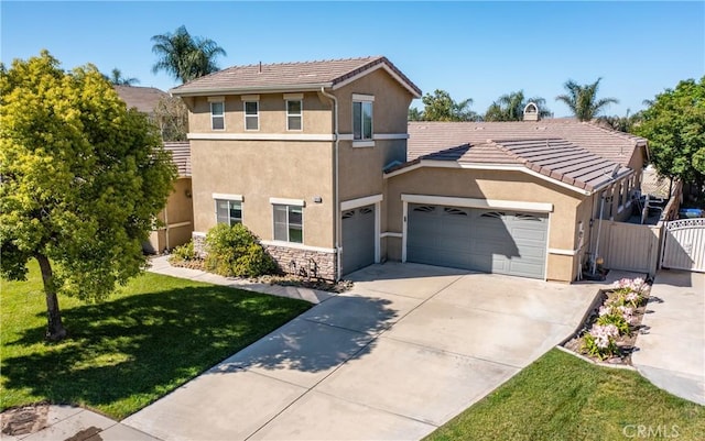7840 La Cresta St, Highland, CA 92346 - view of front of house with stucco siding, driveway, a tiled roof, and an attached garage