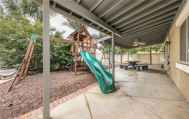 7840 La Cresta St, Highland, CA 92346 - view of play area with a fenced backyard and a patio area
