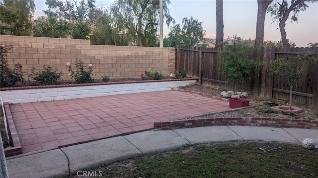 10228 Via Pavon, Moreno Valley, CA 92557 - view of patio featuring a fenced backyard