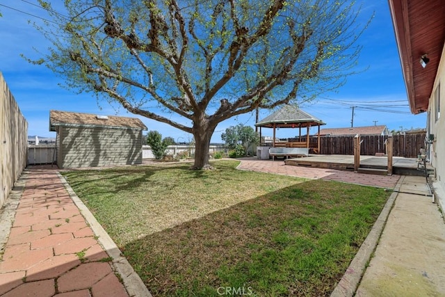 459 Roosevelt St, Coalinga, CA 93210 - view of yard with a gazebo, a patio, and an outbuilding
