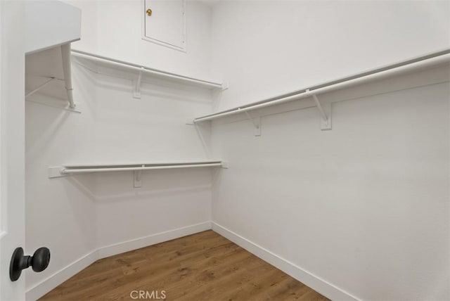 8 Galanto, Irvine, CA 92614 - walk in closet with wood finished floors
