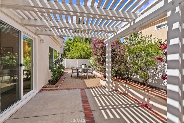 8 Galanto, Irvine, CA 92614 - view of patio featuring outdoor dining space, a fenced backyard, and a pergola