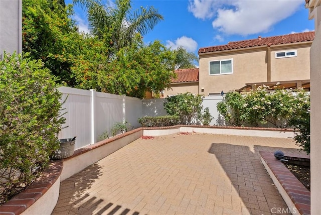 8 Galanto, Irvine, CA 92614 - view of patio / terrace with a fenced backyard