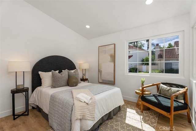 8 Galanto, Irvine, CA 92614 - bedroom with baseboards, wood finished floors, recessed lighting, and vaulted ceiling