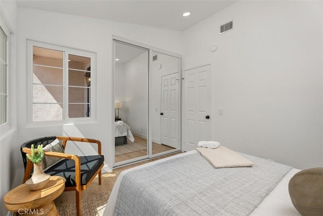 8 Galanto, Irvine, CA 92614 - bedroom featuring wood finished floors, recessed lighting, and a closet